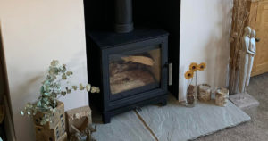 stove fire with logs inside